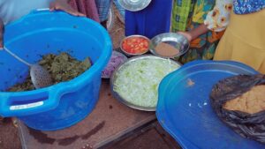 Boiled Moringa leaves, sliced cabbage and other food items